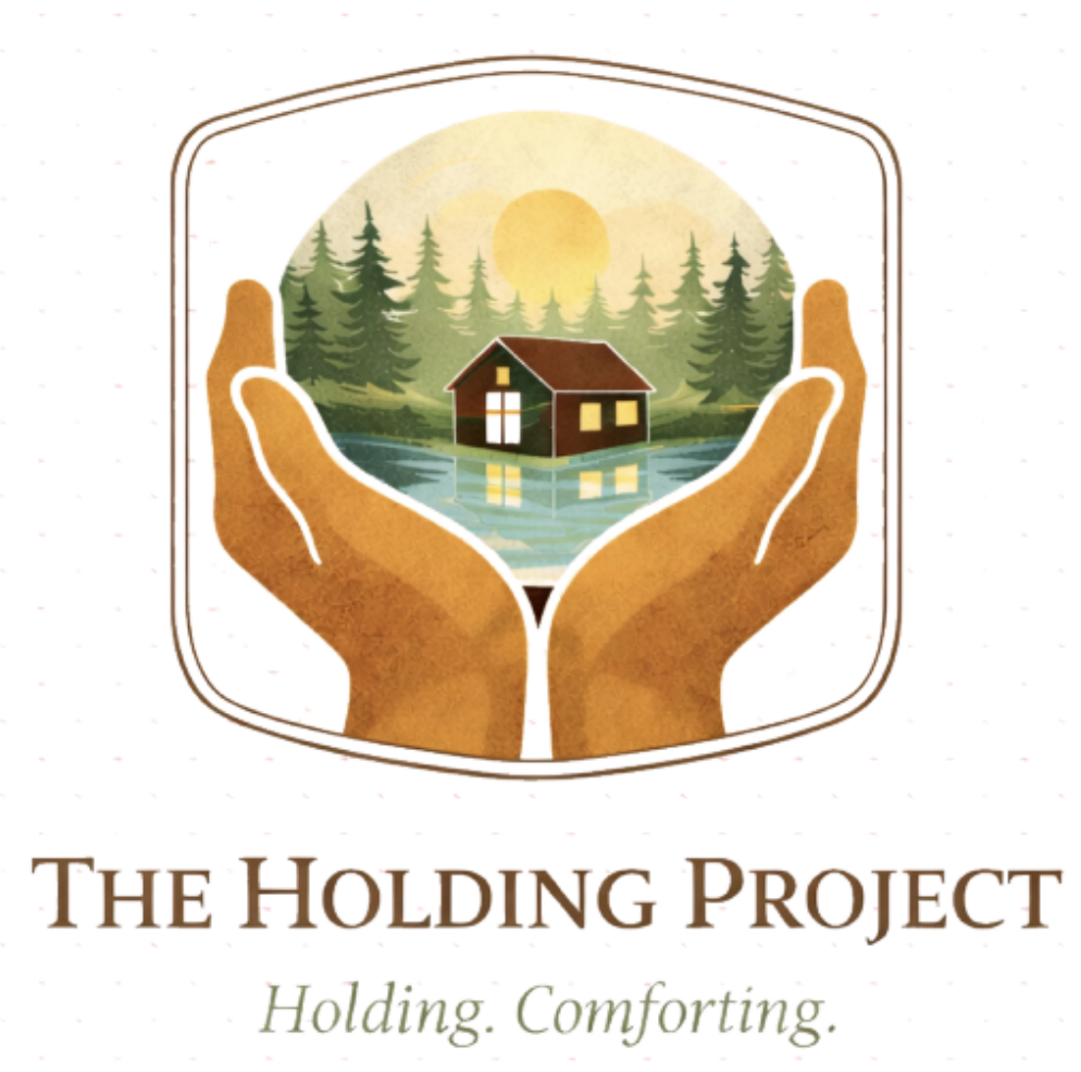 The Holding Project logo โ hands holding a cabin in the forest